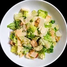 Caesar Salad with romaine, shaved parmesan, and croutons at BLVD Grille