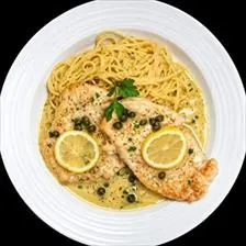 Chicken Piccata with lemon caper sauce over herb spaghetti at BLVD Grille