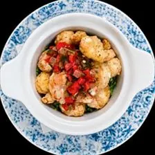 Crispy Shrimp topped with roasted pepper relish at BLVD Grille
