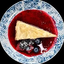 Limoncello Cheesecake with mixed berry sauce at BLVD Grille